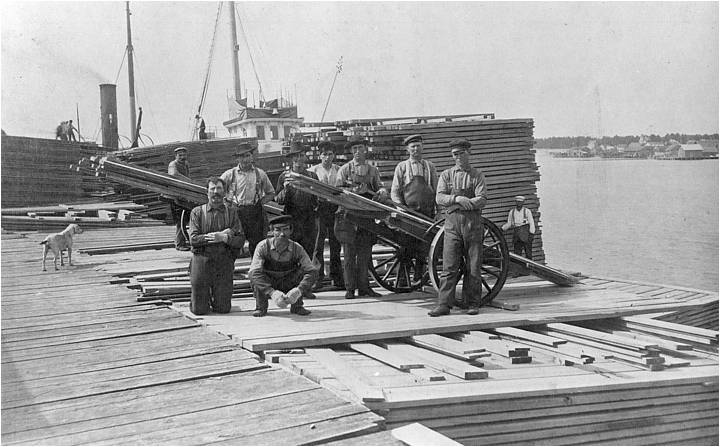 loading planks at the Beaver Island Lumber Company dock - Beaver Island