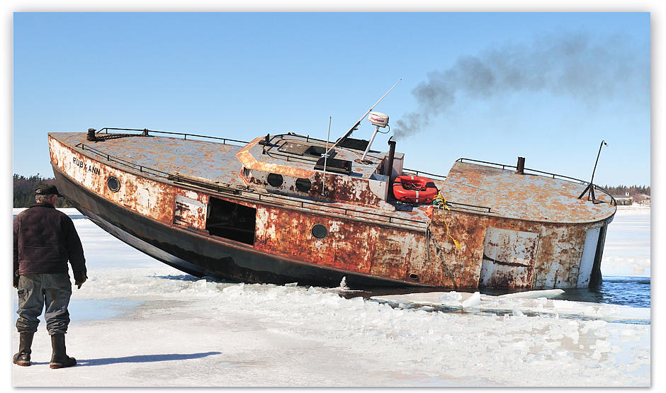The boat's weight is used to break the ice shelf, the force being clearly felt on our feet standing on the ice beside