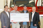 Fireman's Fund Insurance presents check to Beaver Island Fire Department