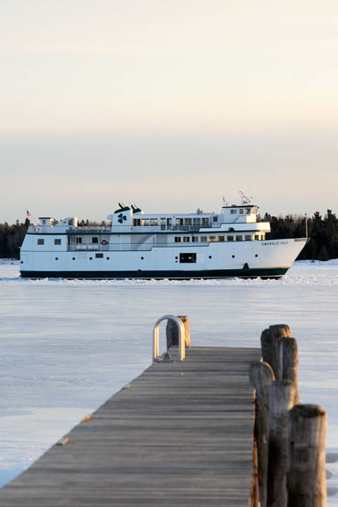 Emerald Isle passes the dock at CMU Boathouse